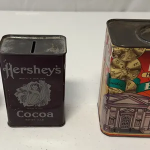A lot of three vintage metal advertising banks