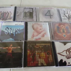 10 Assorted CDs Foreigner, Ozzy Osbourne, Van Halen, Sammy Hagar, Etc.