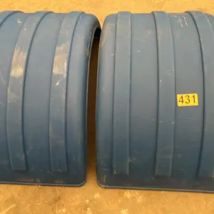 OFFSITE - 2 Mud guards or full wheel fenders for Highway tractor or trailer. Crafted from polyethylene, a durable plastic fender. 25.5” wide , bottom 