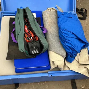 OFFSITE - Radius Heavy Duty display case with walls, rug, table cloth, light and extension cord. With 2 wheels at 1 end in good condition. Measures 13