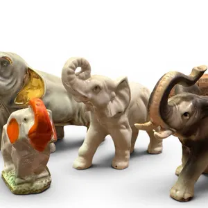 Elephant Figurines in Ceramic and Carved Wood