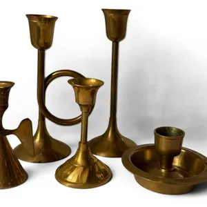Five Brass Candlesticks in Varied Designs
