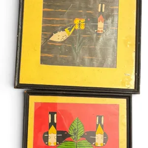 Framed Folk Art Prints Depicting Stylized Birds and Nature Motifs