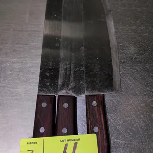 Stainless steel chef's knife. Features a 10" blade and a triple-riveted wood handle.