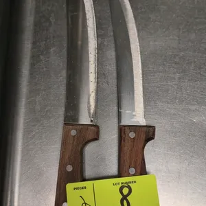 Stainless steel butcher knife. Features a curved cimeter-style blade and a riveted wooden handle.