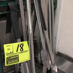 Assorted metal food service utility tongs. Includes 10 pieces of varying styles such as standard stainless steel spring tongs, plastic-coated handle t