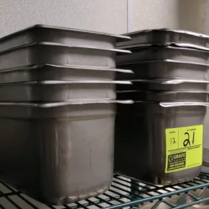 Stainless steel 1/3-size insert pan. Features a 6" depth. Constructed of stainless steel. Note: Rims are bent on multiple units.