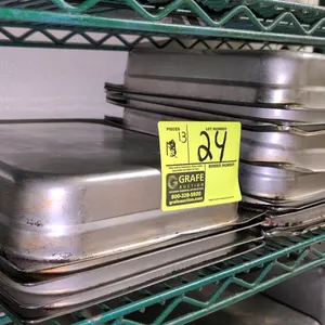 Stainless steel 1/2-size insert pan. Features a 2" depth. Designed for steam tables, prep tables, and food storage. Note: Lot includes thirteen pans. 