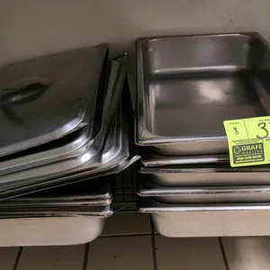 Set of (5) full-size stainless steel insert hotel pans with (5) matching lids. Features durable stainless steel construction and 4" depth. Lids featur