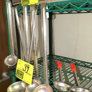 Assortment of stainless steel ladles. Includes hook-handle and plastic-handled styles with stamped capacities of 2 oz (59ml) and 4 oz (118ml).