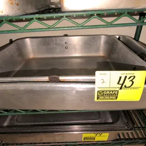 Package lot of (2) aluminum roasting pans. Includes (1) 20"x16"x5" pan and (1) 24"x17"x5" pan. Features commercial-grade aluminum construction with se