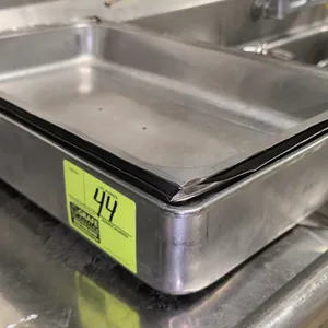 Stainless steel full-size chafing pan. Includes (2) stainless steel dome lids, with one featuring a black plastic handle and the other handle-free. Pa