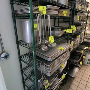 Green epoxy wire shelving rack. Features 8 adjustable wire shelves, ideal for wet or dry commercial kitchen storage. Dimensions: 36"x14"x75". Contents