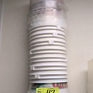 Assorted quantity of poly round containers. Includes clear food storage containers with integrated side handles, white plastic buckets, and clear plas