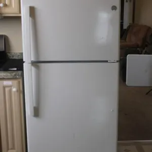 GE Refrigerator, Water Line Has Shutoff Valve, Measures 30 x 34 x 66