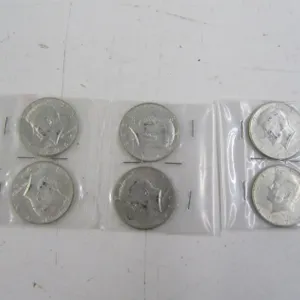 (6) Kennedy Half Dollars