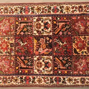 HANDKNOTTED WOOL AREA RUG 51"X44"