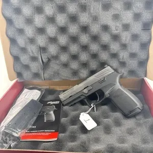 Sig P320 9MM
Two 17 round clips and box