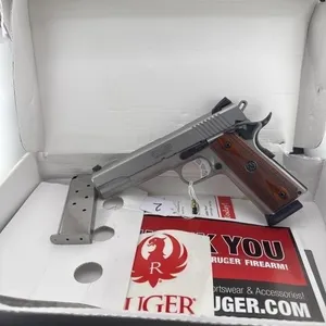 Rugar 1911 45 caliber 
Box, one 8 round clips,