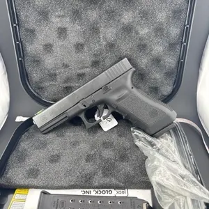 Glock 22 .357 with extra 40 cal barrel
Two 15