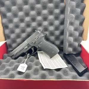 SIG P226 9MM
Two 15 Round clips and box included