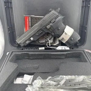 SIG M11-A1 9MM
Case, and three 15 round clips