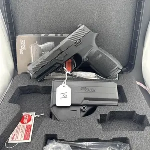 SIG P320 357 caliber 
Case, holster, and two 14