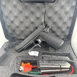 Sig 1911 357 cal 
Case and four clips included