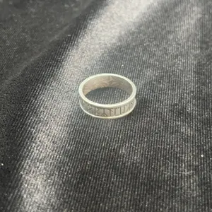 Sterling Silver Ring with Rune-Inspired Engravings
