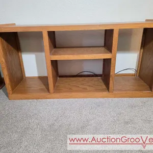 Wooden Entertainment Center. 62.5 x 17 x 30. *you must bring adequate help to remove and load. Located on main floor. LR