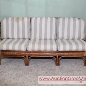 Metro Designs Rattan Couch. The cushions have removable covers one has a stain. 80 x 32 x 33. *you must bring adequate help to remove and load. Locate