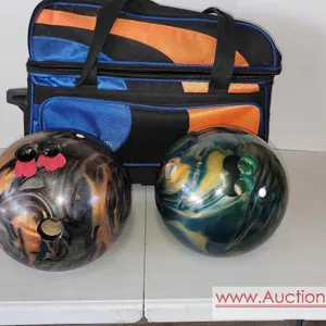 2 - EBONITE CYCLONE BOWLING BALLS plus a Pyramid Double Ball, 2 wheel cart / case. GN