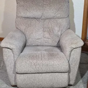 La-z-boy Reclining Chair. The seat cushion feels a little worn but the chair looks too be in decent shape. 35 x 30 x 38. *you must bring adequate help