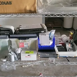 Assorted office supplies package lot. Includes a Fellowes Saturn 3i 95 laminator, two Office Depot portable plastic file boxes, two storage clipboards