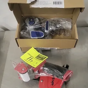 Handheld packaging tape dispenser lot of 4. Includes (2) red tape guns with plastic handles and (2) blue and white tape guns. Features integrated cutt