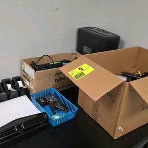 Assorted office supplies lot. Includes a Pen+Gear 6-sheet paper shredder, a MetroVac DataVac Pro hand vacuum/duster with attachments, (6) desktop tape