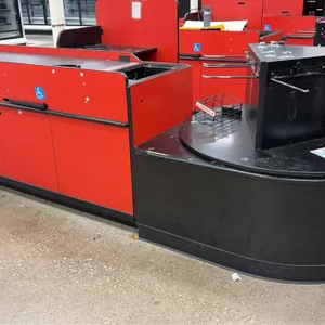 2021 Royston UL2 single belt check lane. Features a red and black finish, register stand, circular bag stand with tines, and single conveyor belt. 7'L