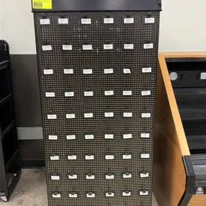 4-way pegboard gift card display stand. Features a black metal frame, top header sign holder, and four pegboard display faces. Includes pre-installed 