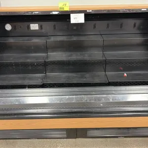 2021 Southern CaseArts LMRM-HA-06.0 6'L self-contained refrigerated berry display case. Features multi-tier step shelving, wood grain exterior panels,