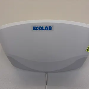 Ecolab wall-mounted bug light. Features a gray and white plastic decorative sconce-style housing. Wall-mounted design with a corded power supply.