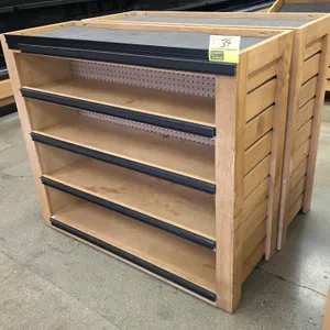Bradley wood produce display fixture. Features multi-tier shelving with four shelves and a top display deck. Equipped with black ticket rails on shelf