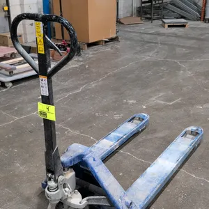 2018 Unbranded AC25 manual pallet jack. Features a 5,500 lb load capacity, 27"W x 48"L forks, and a manual hydraulic pump handle with an integrated re