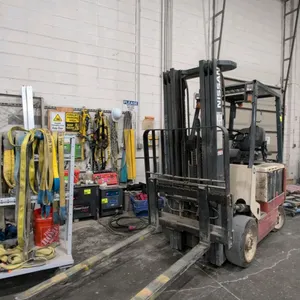Nissan CWGP02L30C electric forklift. Features a 3-stage mast with a 187" max lift height, forks with side shift, and 7,359.7 indicated hours. Chassis 