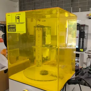 Elegoo Mercury XS Cure UV curing station for 3D printers. Features a transparent yellow UV protection cover, integrated LED columns, front control dia