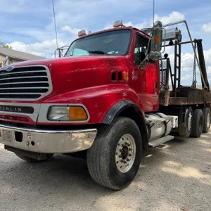 Sterling  Quad Axle Rolloff Truck