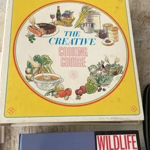 Assorted books and birthday sign