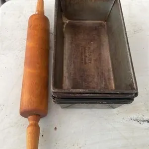 5 bread loaf pans and rolling pin