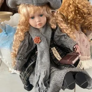 Vintage doll with chair