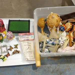 Tote wit assorted Maracas's, sppons, Hermonica,