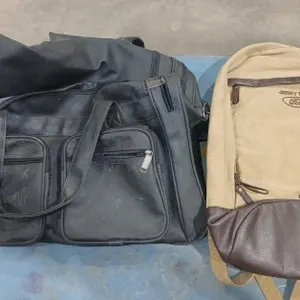 Black leather wheeled bag with handle & Cloth